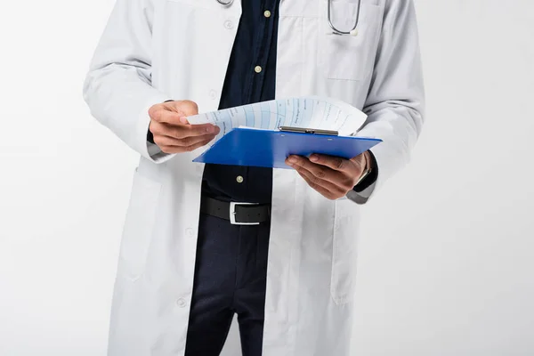Cropped view of doctor holding clipboard isolated on grey — Stock Photo