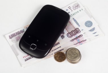 Mobile payment. Cell Phone and Russian money clipart
