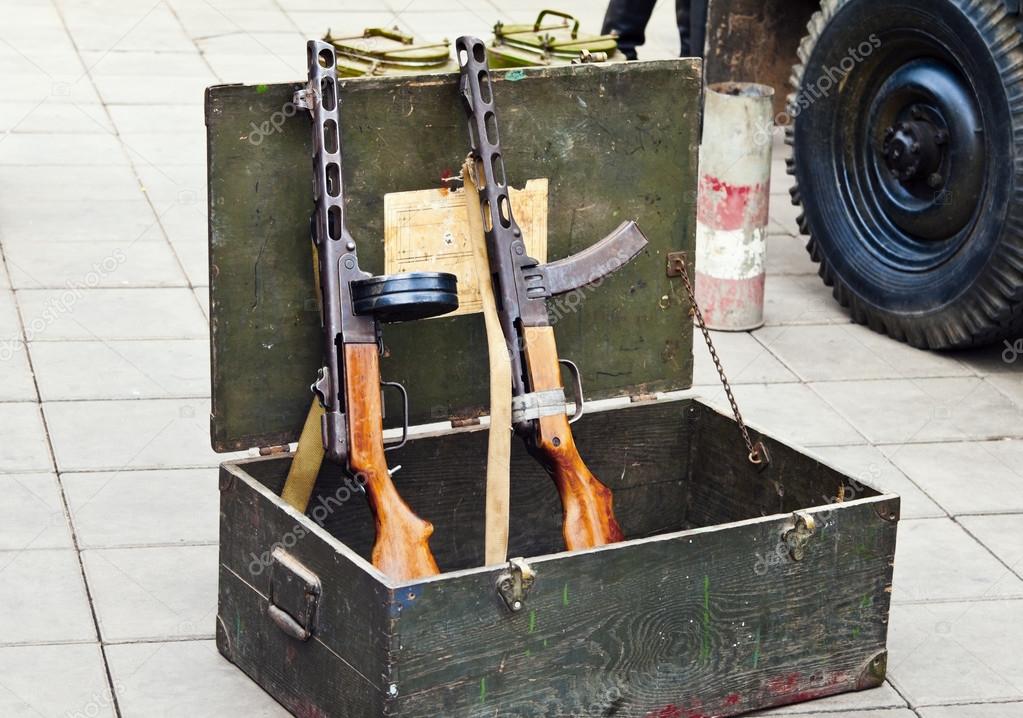 Two submachine gun PPSH with disc and box magazine, in a box from under rounds