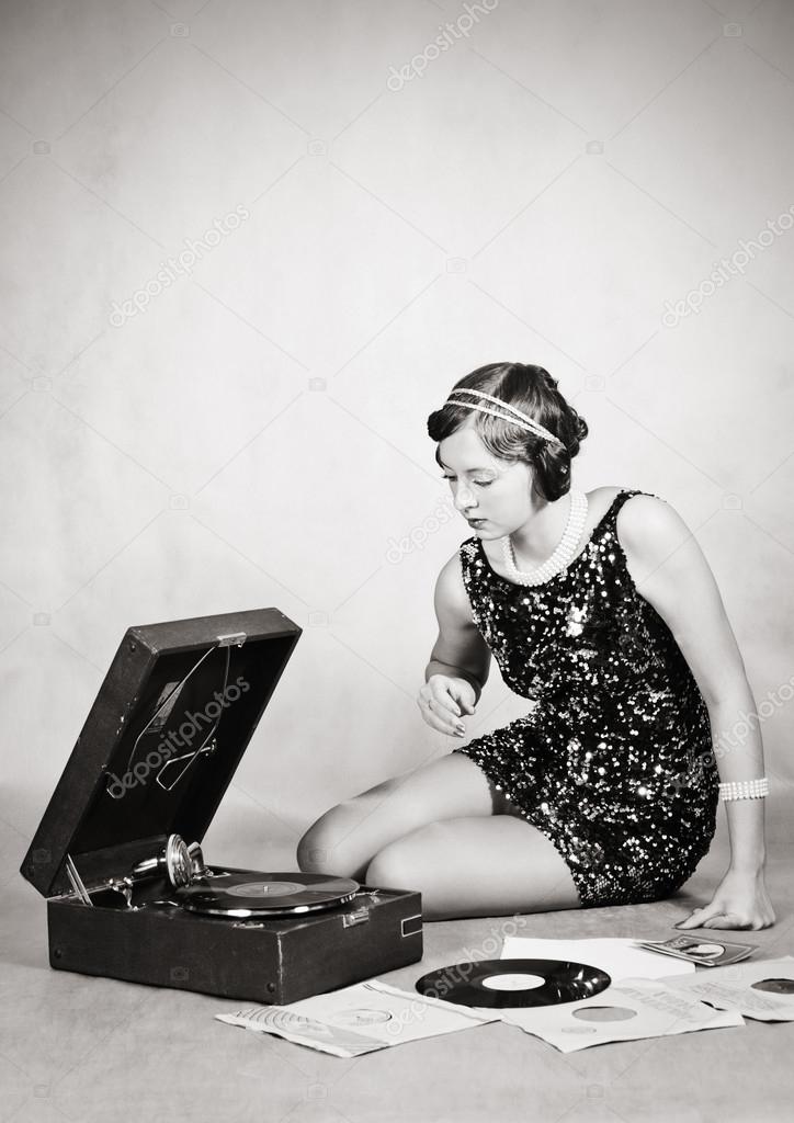 Girl listening to gramophone records. Vintage ⬇ Stock Photo, Image by © Vadyuhin #95830116