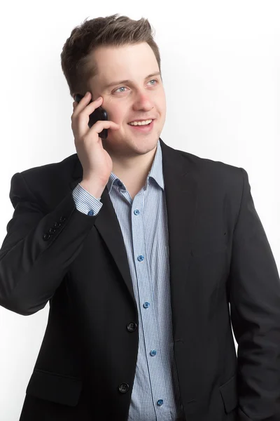 Man talking on the mobile phone and smiling — Stock Photo, Image