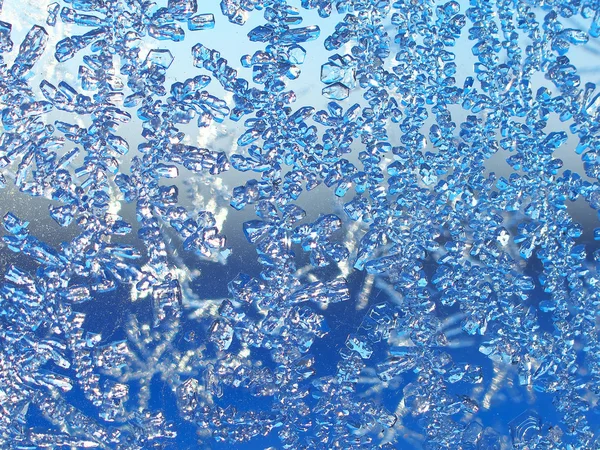 Ice patterns on winter glass — Stock Photo, Image