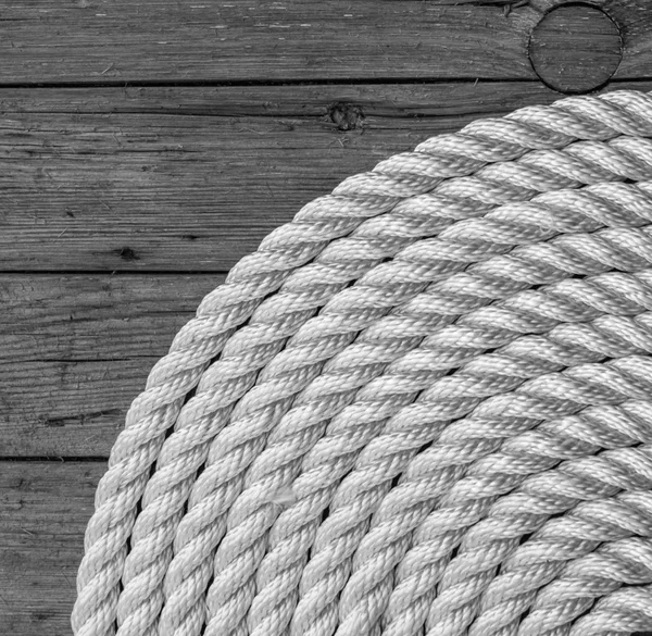 Vinutí lana na dřevěné pozadí — Stock fotografie