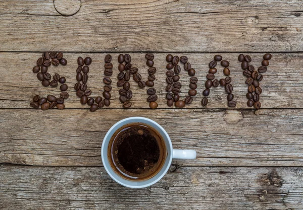 Taza de café sobre fondo de madera —  Fotos de Stock