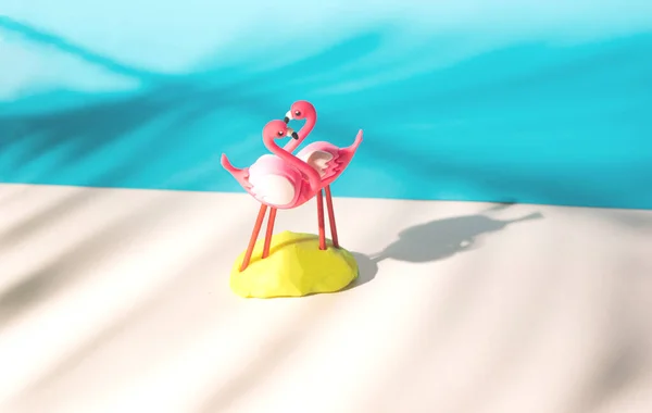 Dois Brinquedos Flamingos Com Sombra Folha Palma Grau Ângulo Nível — Fotografia de Stock
