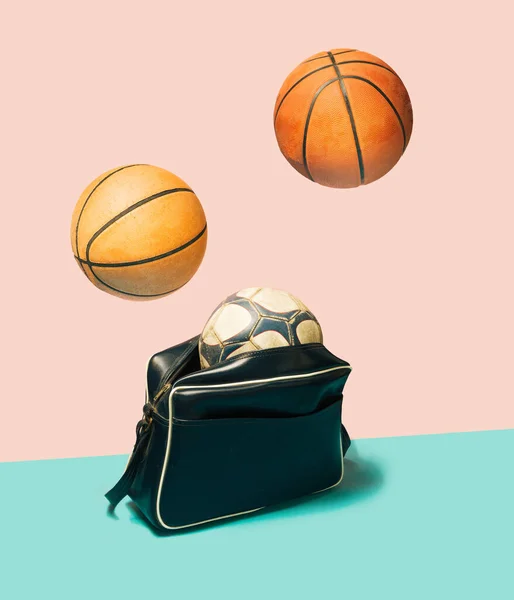 Timeless recreation retro sport bag concept with levitating basketballs. Bright pink and blue background.