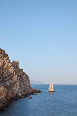 mountain and sea, rock sail, rocks, water, calm on the water, seascape