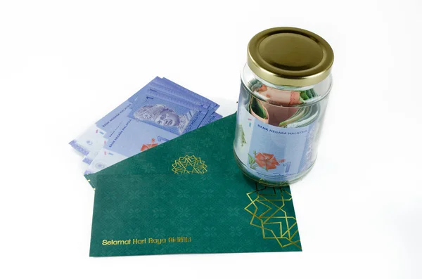 Saving Duit Raya — Stock Photo, Image