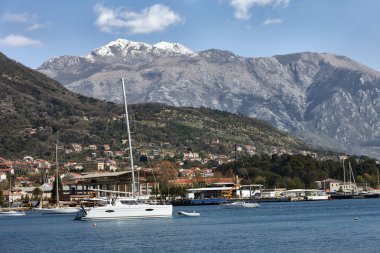Mountain Lovcen peak and yacht