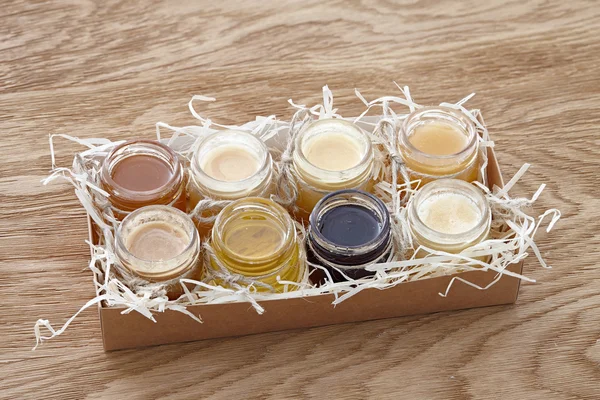 Different kinds of honey in a box