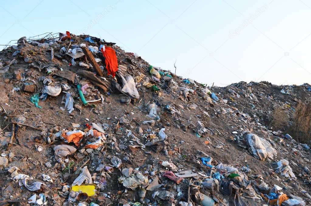 Garbage dump. A pile of household waste, a place for recycling