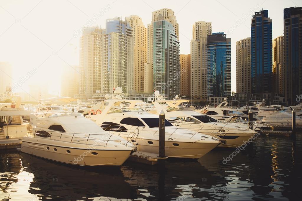 Expensive area in Dubai Marina. Beautiful skyscrapers and luxury yachts