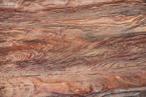 Bossy sandstone formation close-up in one of the many tombs in P