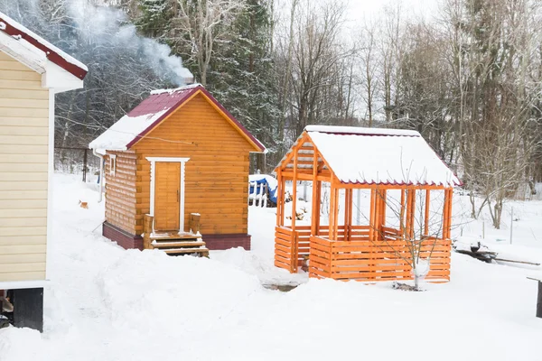 Wooden bath with a gazebo outside the city in winter — Stock Photo, Image