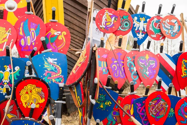 Ancient wooden shields and swords