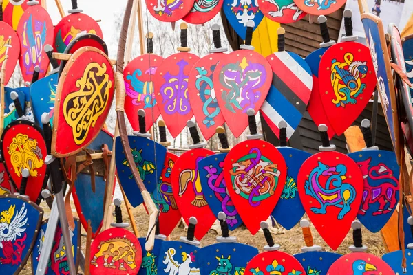 Ancient wooden shields and swords