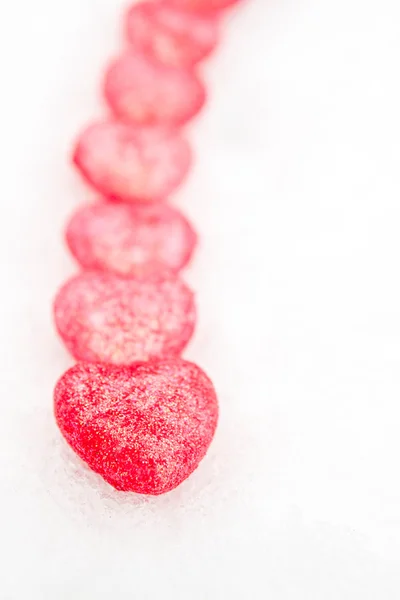 Pink hearts in the snow — Stock Photo, Image