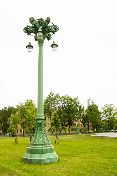 Electric ancient pillar with three glass plutonomy — Stock Photo, Image