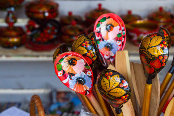 Wooden spoon with Khokhloma pattern