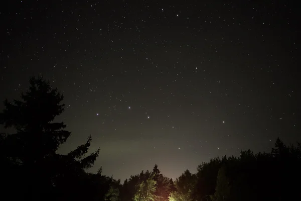 Starry night and campfire Stock Picture