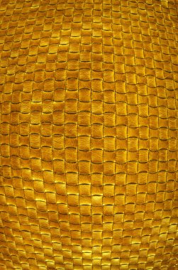 deri örgü altın dokusuna. luxuriousl altın arka plan.