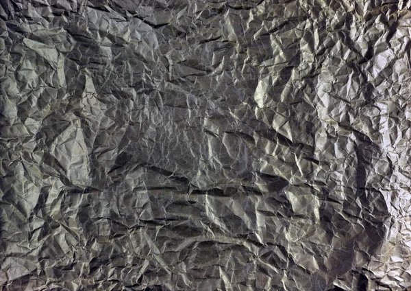 Sheet of crumpled silver paper background. — Stock Photo, Image