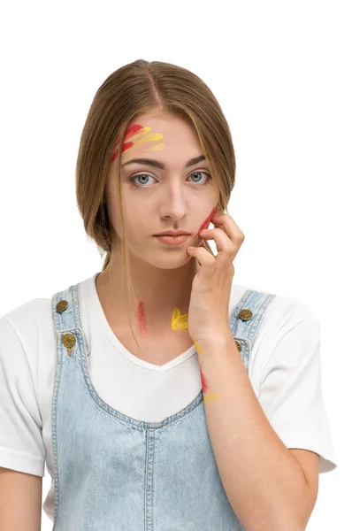 Girl smeared face paint — Stock Photo, Image