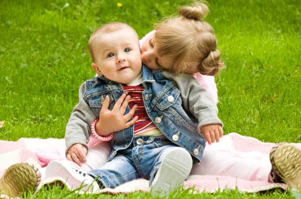 Little girl playing with her favorite brother Royalty Free Stock Images