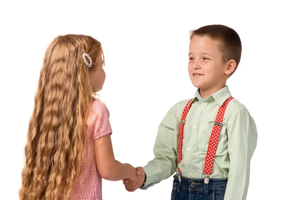 erkek ve kız birbirleri ile tokalaşırken