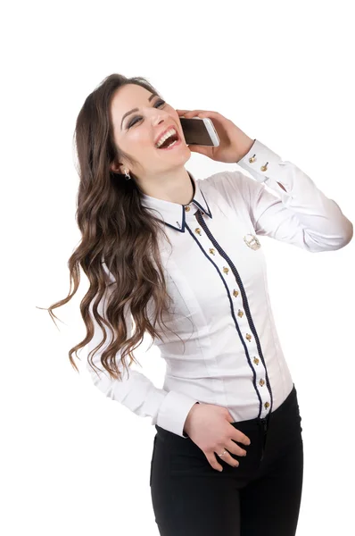 Молода дівчина з телефоном сміється — стокове фото