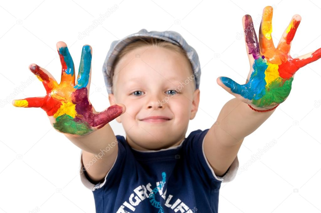 boy's hand in the paint