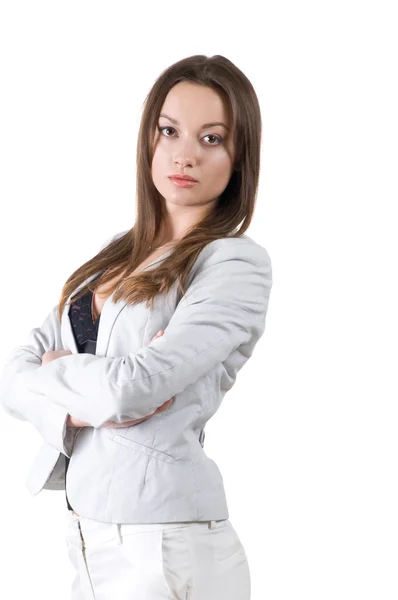 Succesvolle mooie zakenvrouw in een wit pak. — Stockfoto