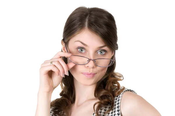 Elegant business woman with glasses smiling coquettishly — Stock Photo, Image