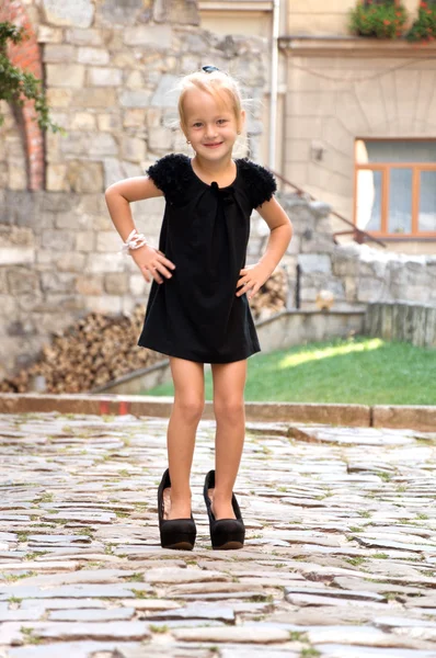 Little girl dressed like an adult woman — Stock Photo, Image