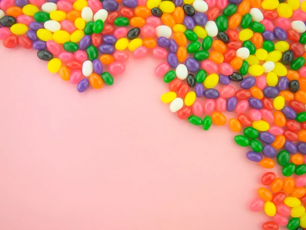 Jelly Beans Frame en achtergrond (roze achtergrond ) — Stockfoto