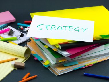 İşle ilgili belgeleri yığını; Strateji