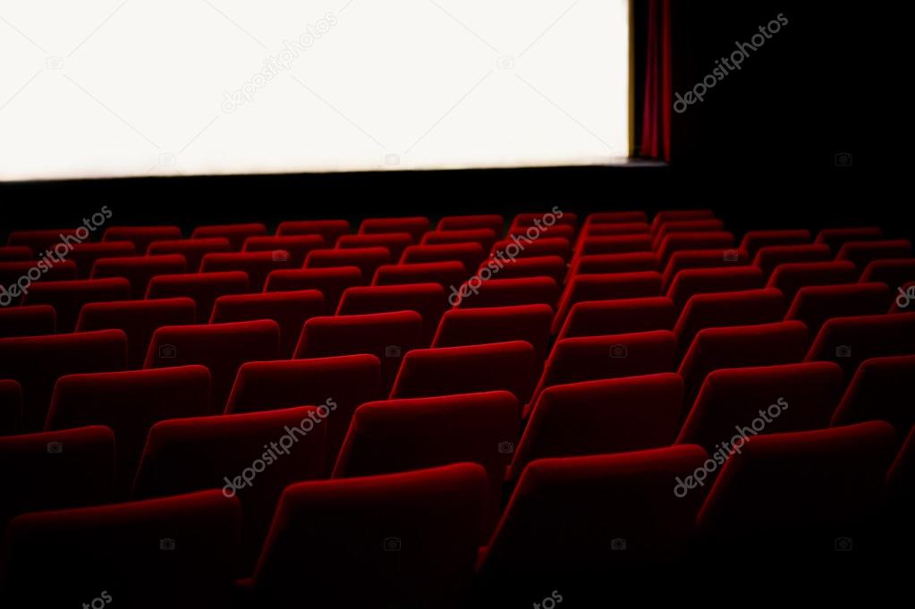 Red chairs in the cinema theater