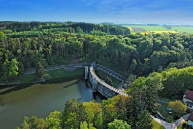 The dam Parizov from plane in the beautiful summer hilly countryside in the Czech Republic - aerial photo from ultralight plane