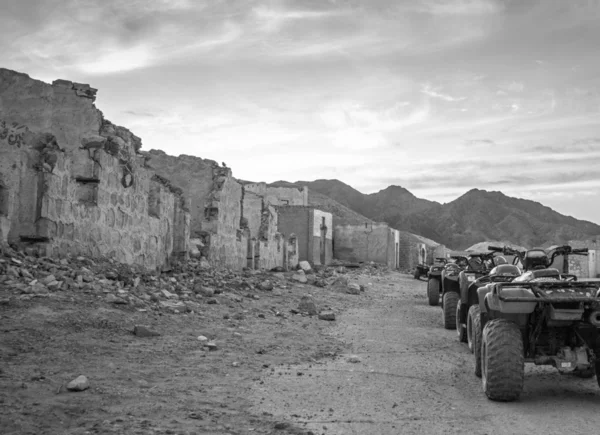 Ghost town. Driving ATV. Egypt, Hurghada Royalty Free Stock Images