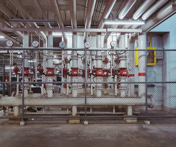 Pipelines pop out in the middle of parking garage