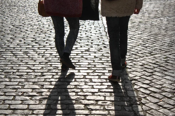 Two People Walking Street Stone Floor Its Shadows — Stock Photo, Image