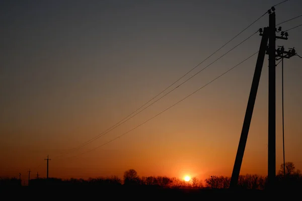 Högspänning Elektrisk Pylon Och Elektrisk Tråd Med Solnedgång Himmel Elstolpar — Stockfoto
