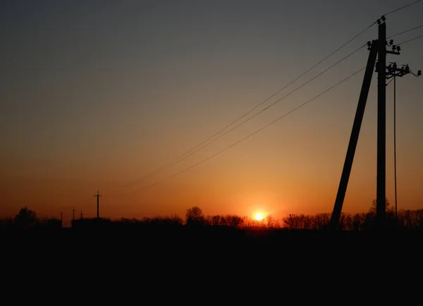 Högspänning Elektrisk Pylon Och Elektrisk Tråd Med Solnedgång Himmel Elstolpar — Stockfoto