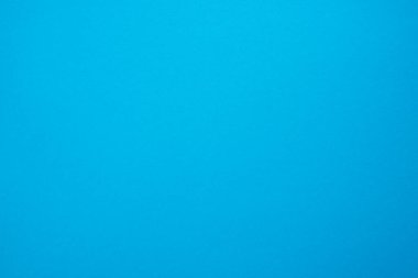 Kağıt, karton arka plan. Yüksek çözünürlüklü kağıt dokusu. Renkli Mavi arkaplan.