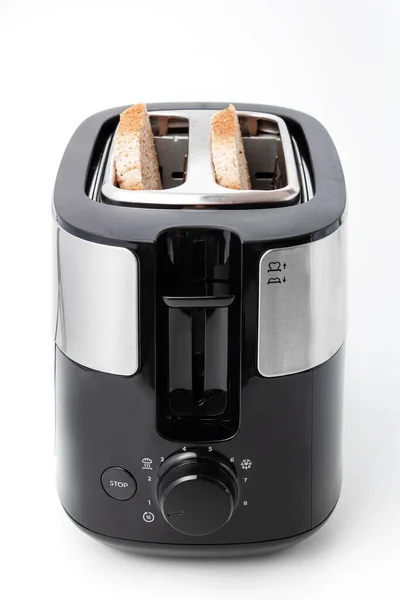 Ekmek manzaralı, beyaz arkaplanda izole edilmiş tost makinesi siyah rengi