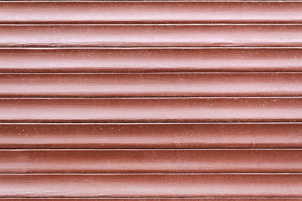Red striped wall with wood, horizontal stripes, street texture wall