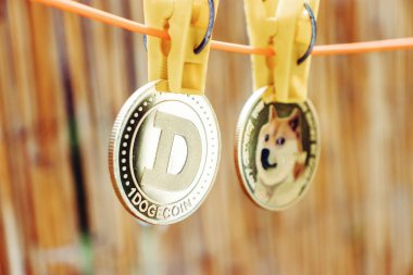Dogecoins on a clothesline in a close-up clipart