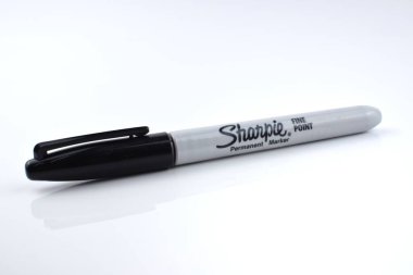 Kedah,Malaysia - 30 Jan 2021: An image of black marker pen by Sharpie brand isolated on a white background. Selective focus image clipart