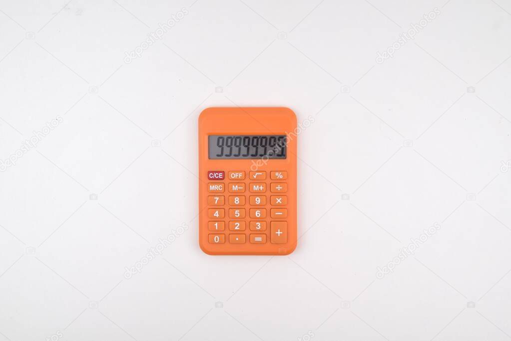 Selective focus image of calculator isolated on a white background. Business and economy concept