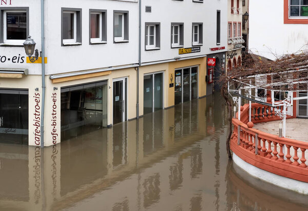 Flooding after heavy rainfall in the down town of Cochem on the Moselle. Cochem is the county seat and the largest town in the Rhineland-Palatinate district of Cochem-Zell.